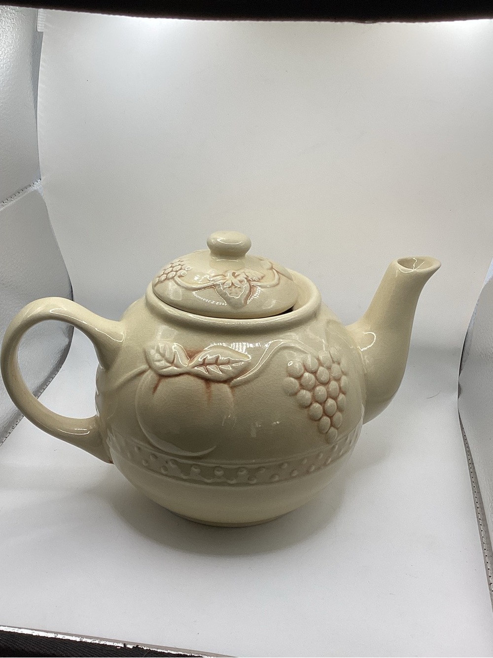Cream Ceramic Teapot with Fruit Relief Design
